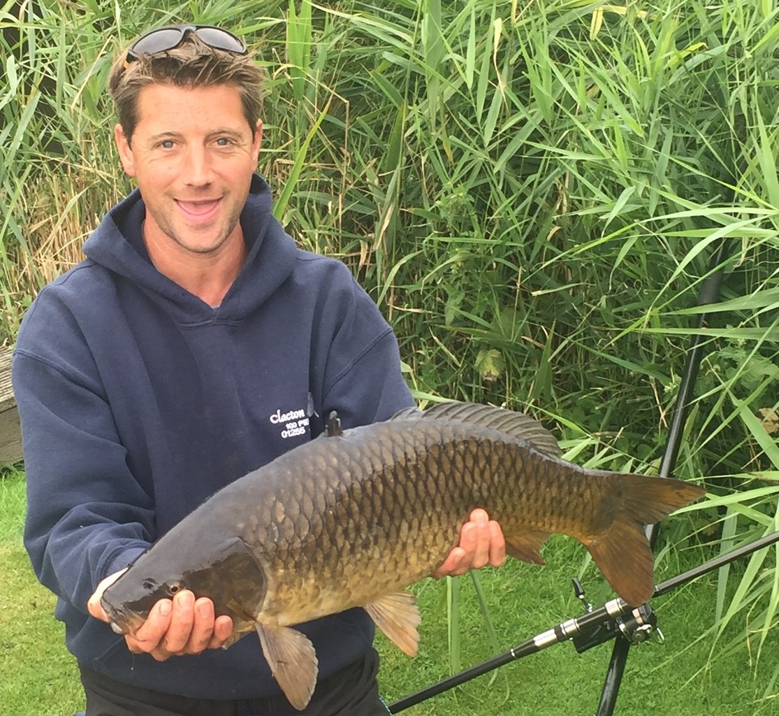 Image of Man Holding Freshly Caught Fish at Badwell Ash Holiday Lodges